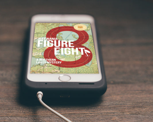 Cell phone showing audiobook cover of Figure Eight: A Northern Lakes Mystery